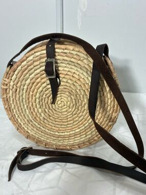 Round Woven Straw Crossbody Bag with Dark Brown Leather Strap